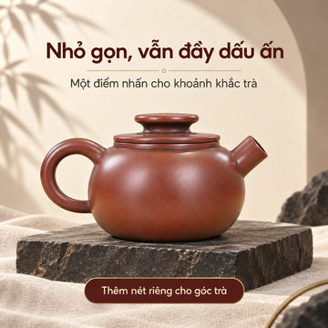 Ấm Nê Hưng · Vòi Pháo