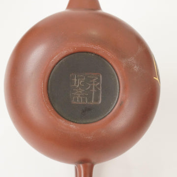 Ấm Nê Hưng · Chiêu Tài