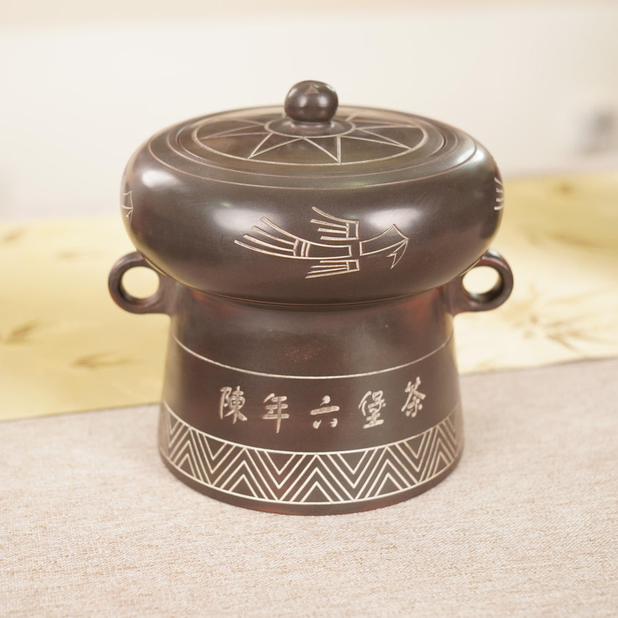 Hũ trà Nê Hưng họa tiết trống đồng dung lượng 250 g